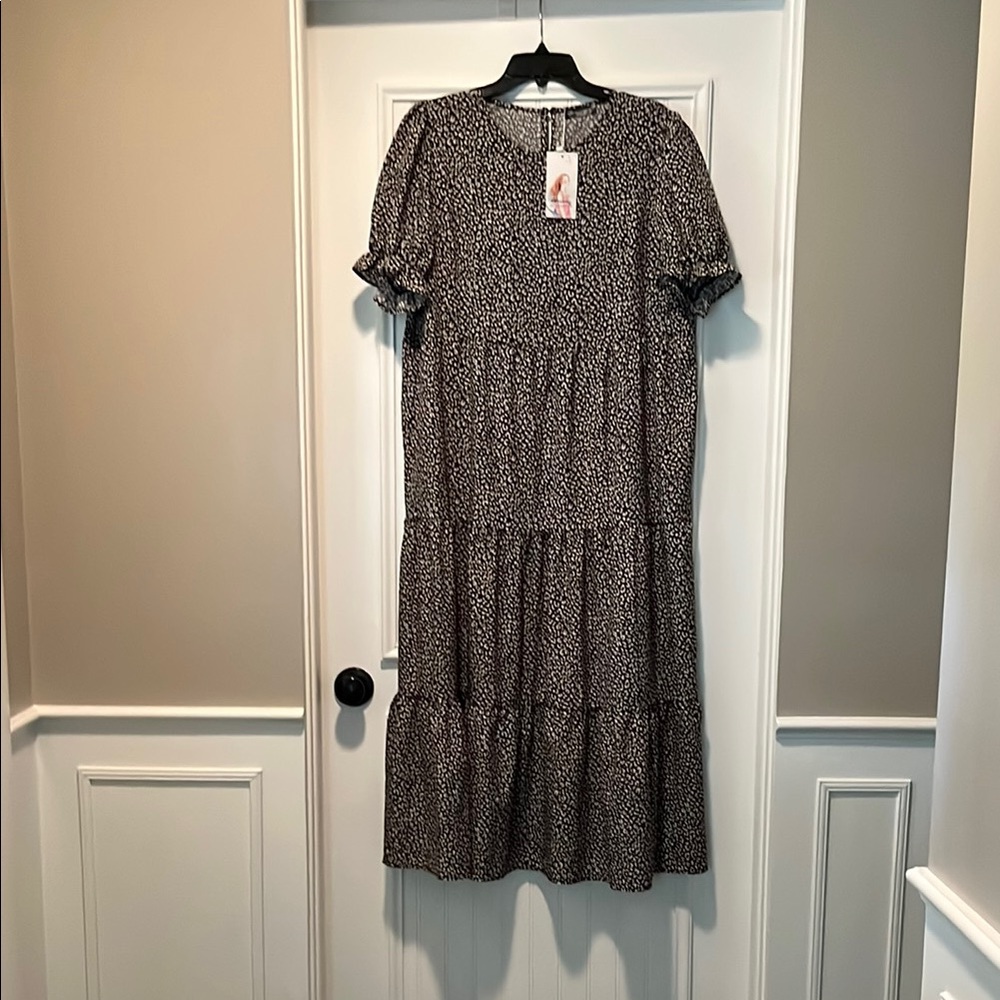 Women’s black/taupe maxi dress with ruffled short sleeves.  NWT.  Size large